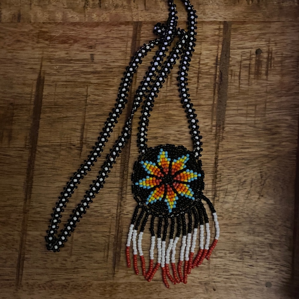 Handmade Black Beaded Pendant Necklace with Yellow & Orange Starburst